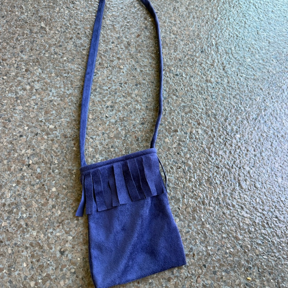 A cute side, body purse with fringe